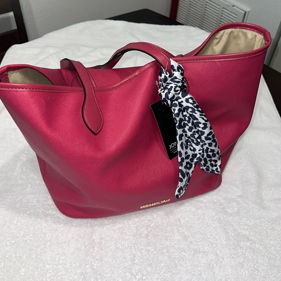 Jones New York Handbags - The color of the bag is pink and the brand is JONES NEW YORK